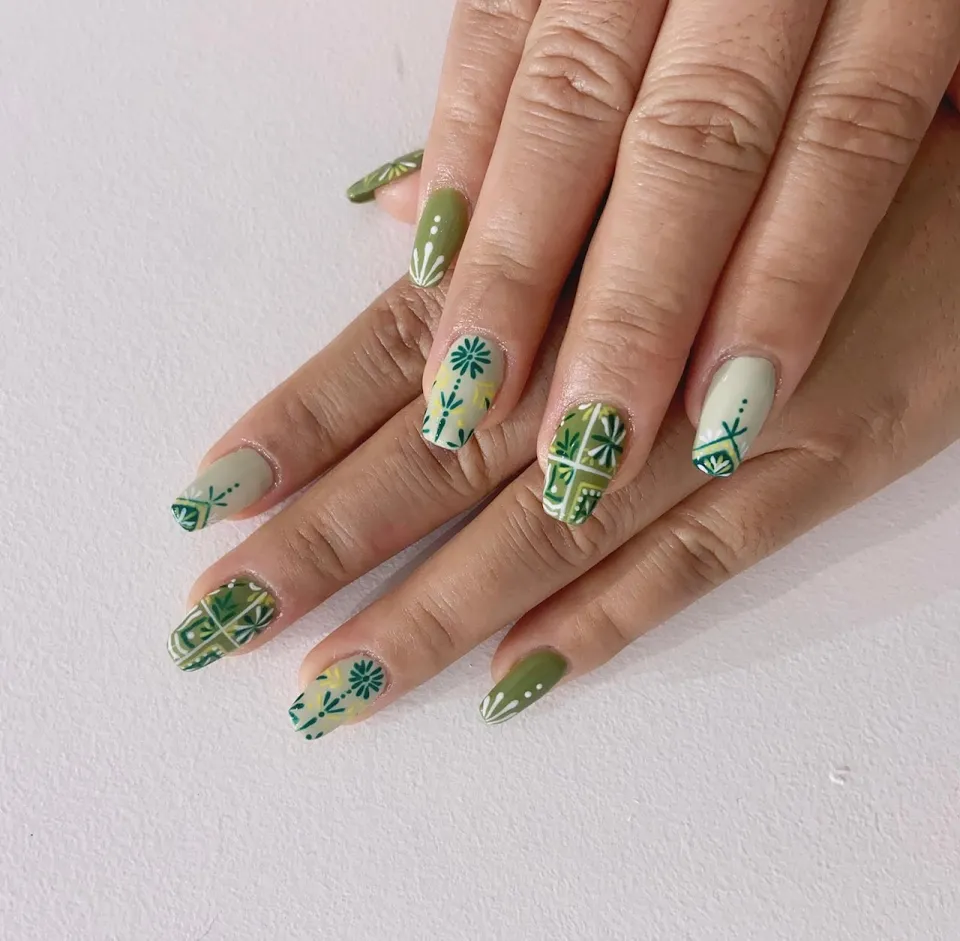 Vibrant pedicure design with playful polka dot nail art